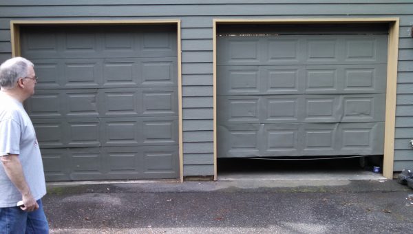 Grey Damaged Garage Door
