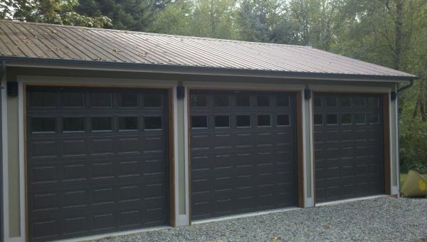 An Example of Brown Garage Doors with Glass Windows